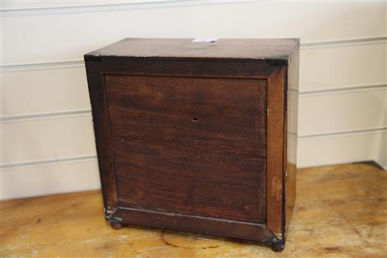 A Regency miniature brass inset mahogany campaign chest, width 12.5in. depth 6in. height 12.5in.